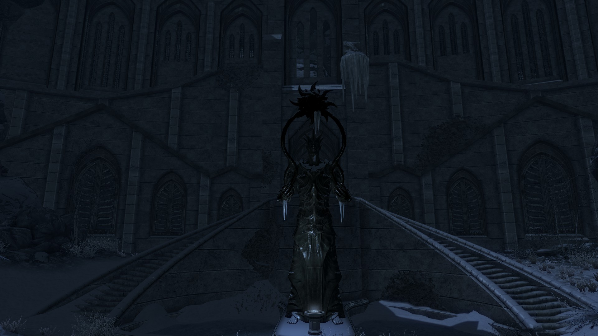 Statue of Auri-El in front of temple